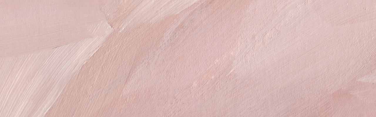 Soft pink and beige tones representing the peace found in emotional healing.