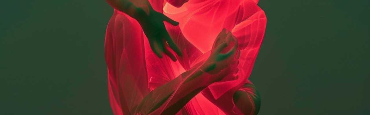 Vivid, glowing forms embracing in sensual motion blur to express the feeling of sex