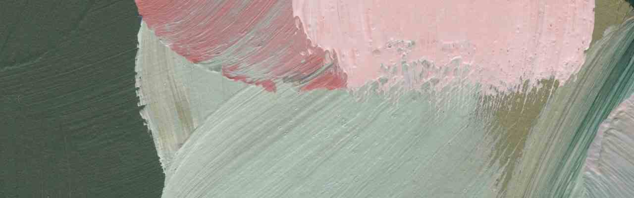 Abstract pink and green brushstrokes creating a soft, harmonious visual.