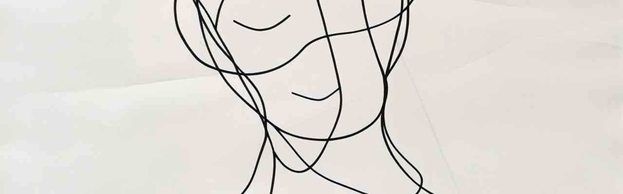 Minimalist line art of a seated figure, symbolizing desire practice through self-reflection, intimacy, and emotional connection