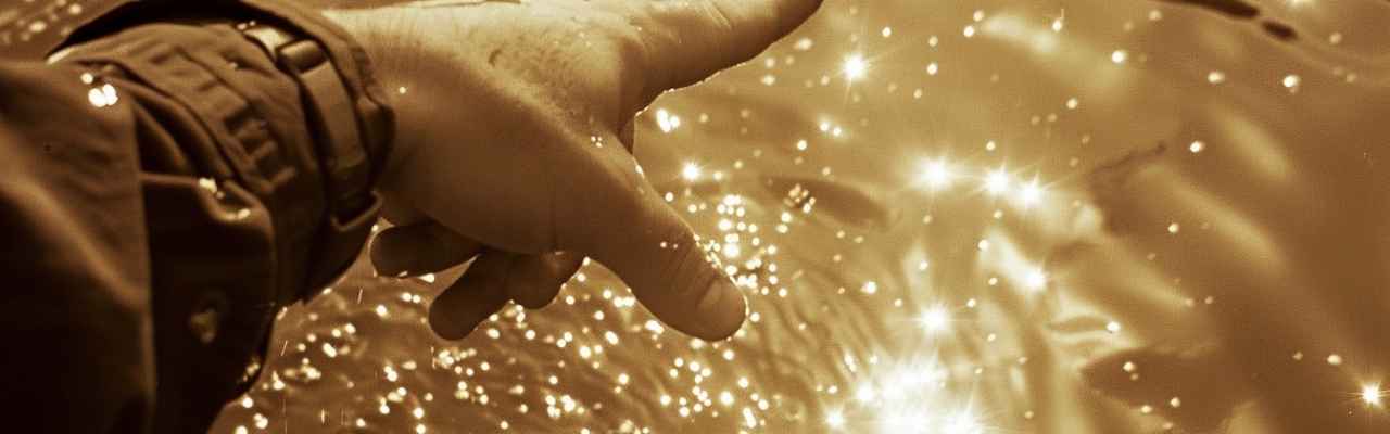Sensual hand motion in illuminated ripples reflecting what is tantric sex essence